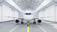 Airplane in a hangar at airport Airplane in a hangar at airport.