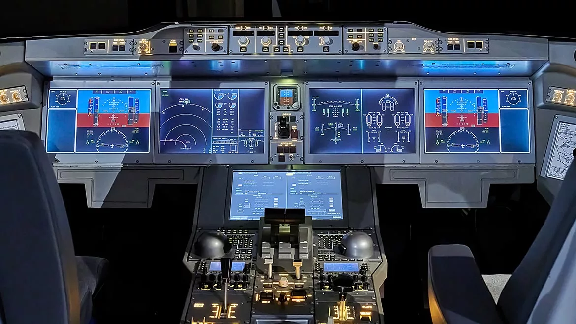 Modern dashboard with controls in the pilot cockpit of a passenger aircraft.