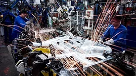 Welders in car factory