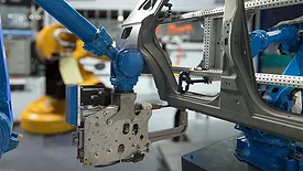 Automobile manufacturing production, robot arm in smart factory.
