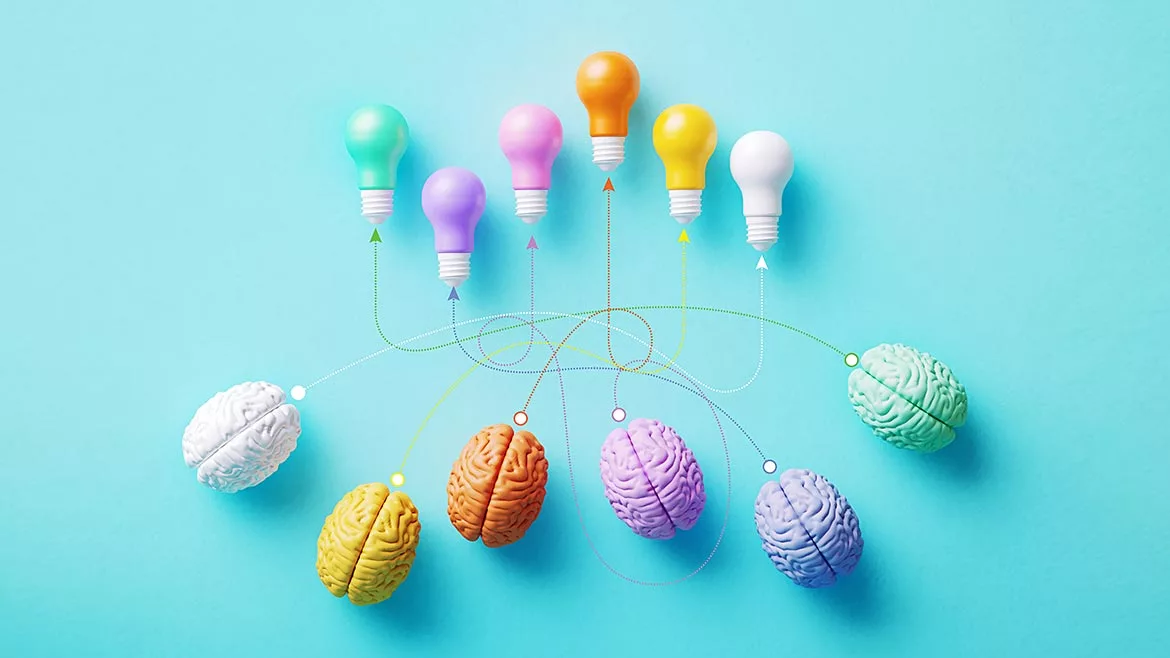 Colorful Lightbulbs Connected To Human Brains By Dotted Lines On Blue Background - Innovation and Teamwork Concept