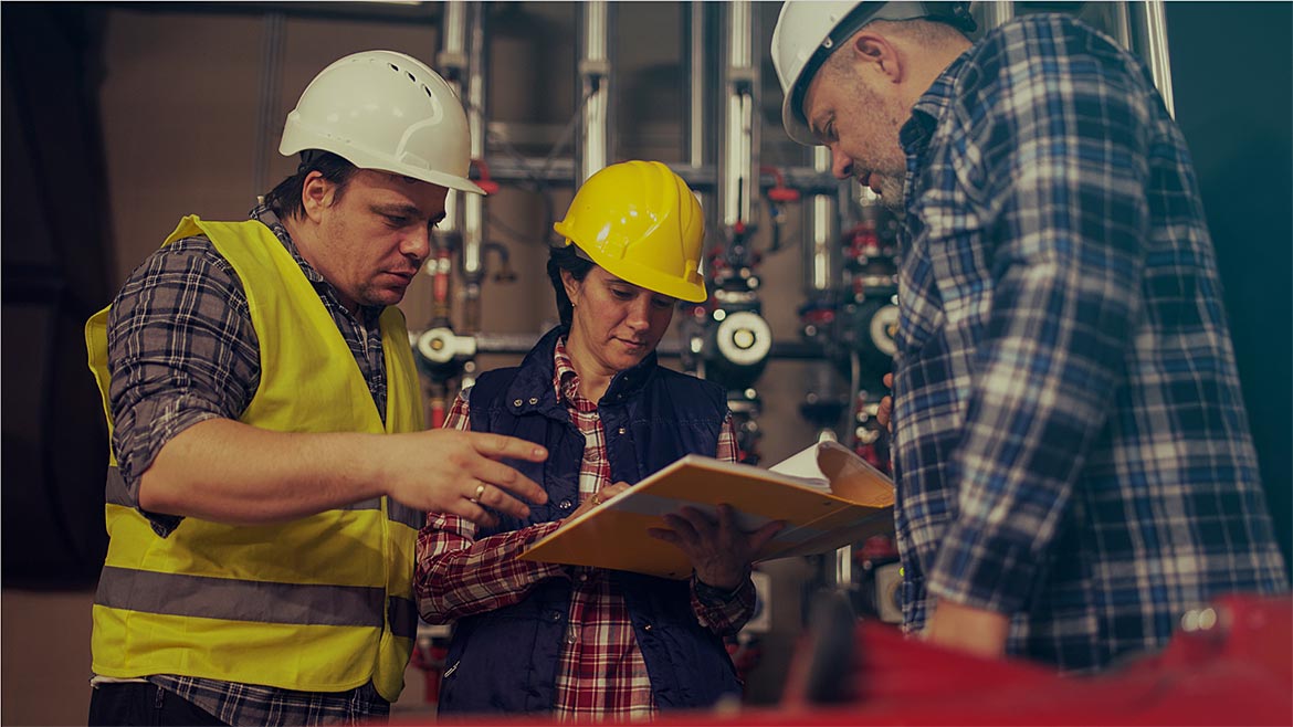 Technicians working in factory
