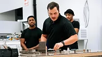 Students from a pilot cohort of a six-week program providing foundational skills in additive manufacturing.