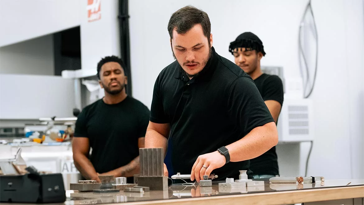 Students from a pilot cohort of a six-week program providing foundational skills in additive manufacturing.