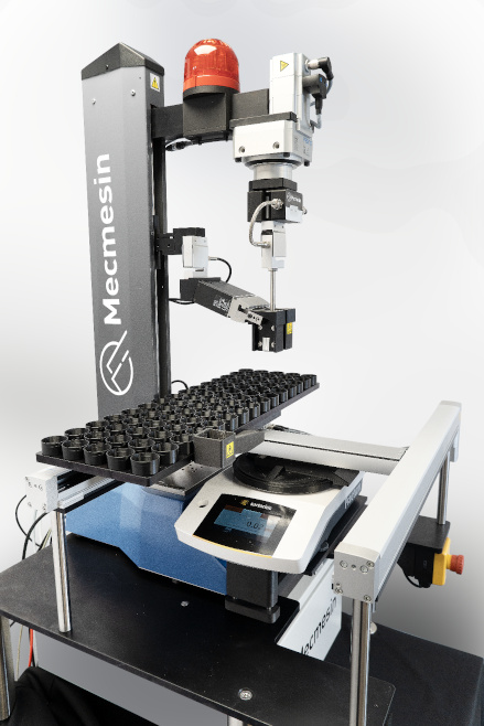 A robotic arm and pneumatic grips.