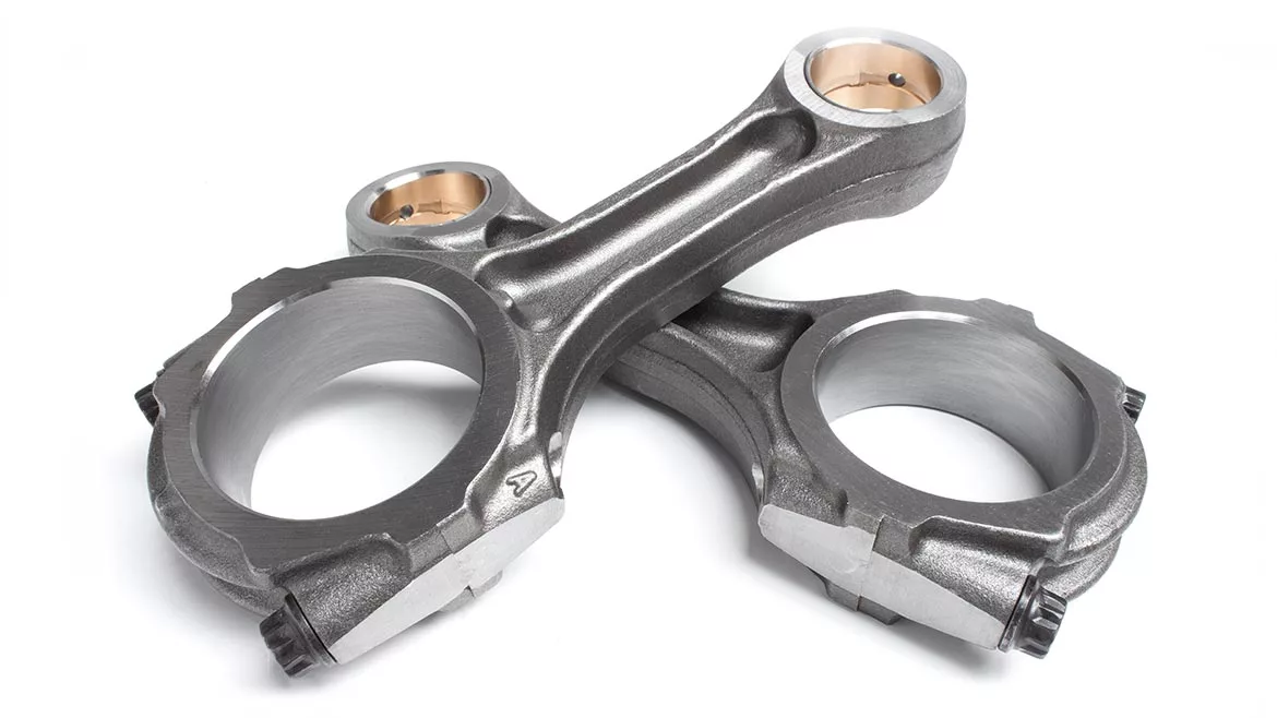 Two connecting rods on a white background.