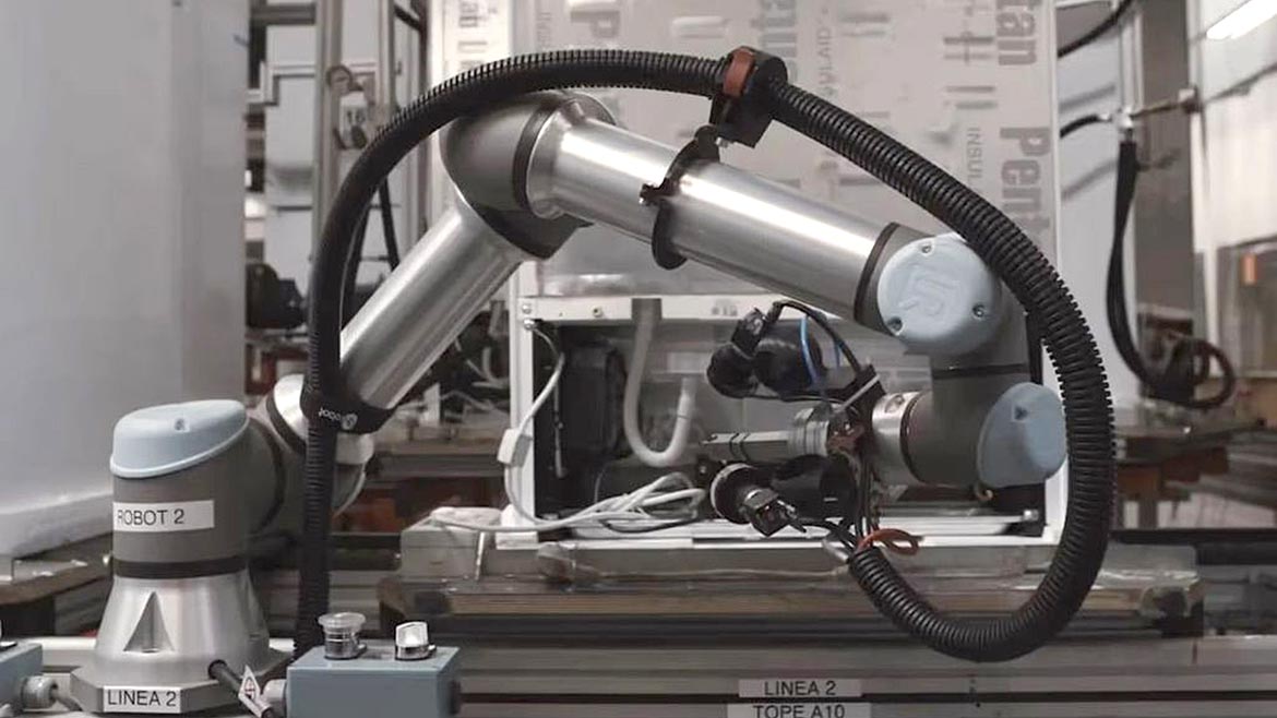Automated end-of-line refrigerator leak testing.