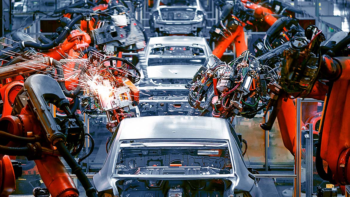 Robot arms in an automotive production line