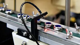 Automatic vision system for inspection nuts in industrial product line.