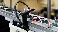 Automatic vision system for inspection nuts in industrial product line.