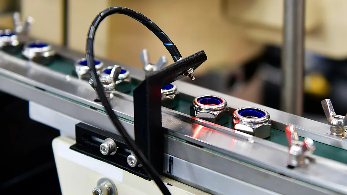 Automatic vision system for inspection nuts in industrial product line.