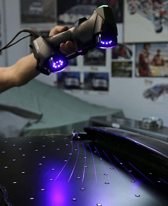 Scanning process using retro-reflective targets.