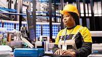 Automated factory engineer analyzing smart manufacturing system Automated factory engineer analyzing smart manufacturing system.
