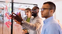 People brainstorming during a business meeting in the modern office.