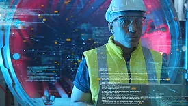 Computer engineer working in factory with laptop computer GUI graphic user interface technology futuristic sci fi HUD background.