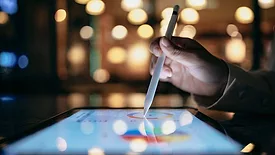 a person using a stylus pen
