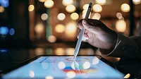 a person using a stylus pen