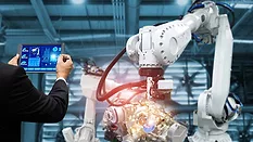 The image illustrates industrial robotic automation controlled by a manager or engineer using a tablet.