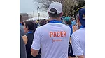 a person participating in a race as a pacer, a runner who helps others maintain a specific speed to achieve their time goals