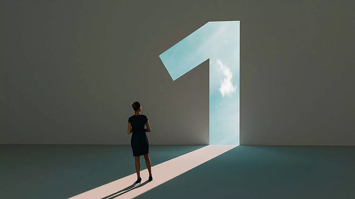 The image is a stock photo that represents the concept of reaching first place, leadership, or a new beginning