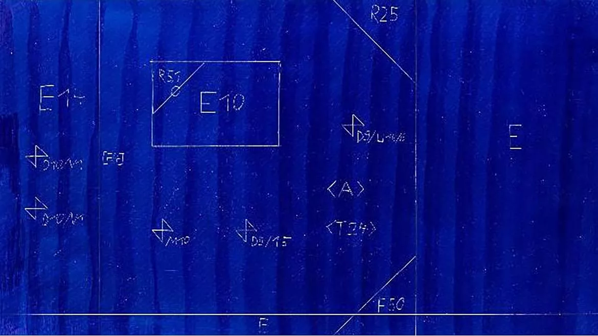 The image displays a blueprint or technical drawing featuring various alphanumeric codes and symbols