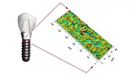 The image displays a 3D surface map of a dental implant's surface roughness, likely generated using a measurement technique like interferometry or confocal microscopy. 