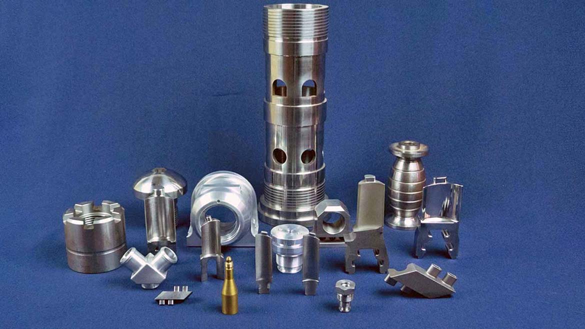 This image displays various precision machined metal components