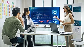 This image depicts a business strategy meeting focused on risk management and data analysis.