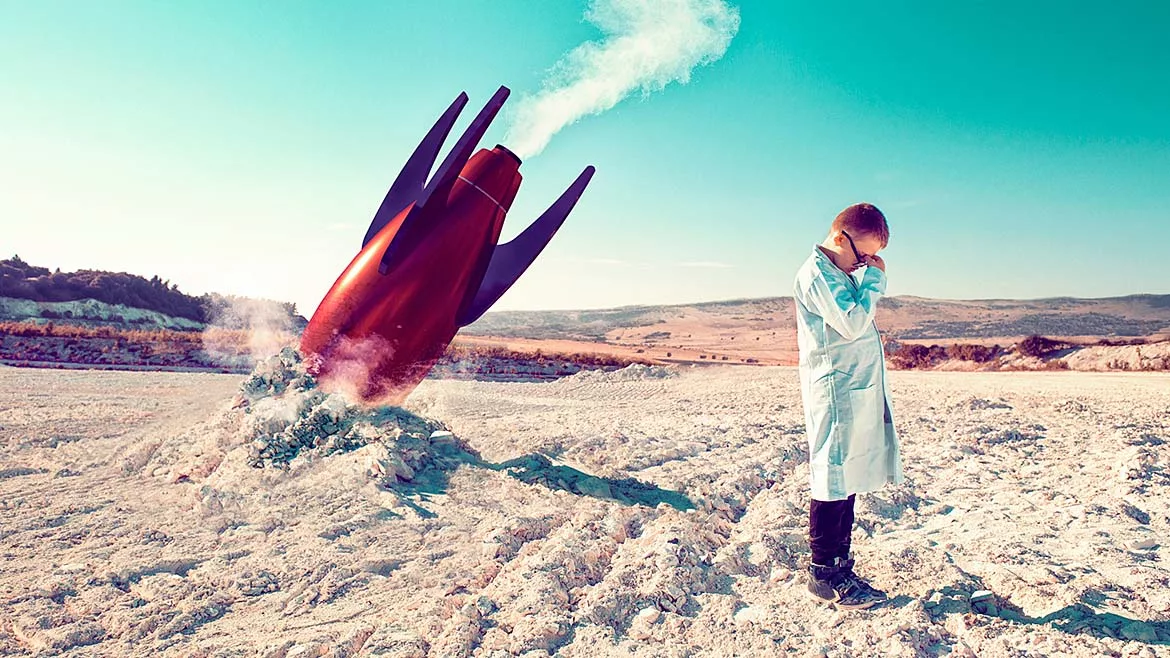 This image depicts a conceptual scene of a scientist or engineer distraught over a failed rocket launch