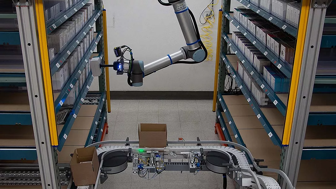 The image features a collaborative robot arm, or "cobot," specifically designed for industrial automation. 