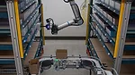 The image features a collaborative robot arm, or "cobot," specifically designed for industrial automation. 