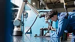 The item pictured is a Universal Robots e-Series collaborative robot