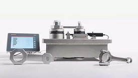 This item appears to be a tribometer, a precision instrument used for measuring friction, wear, and lubrication properties of materials. 