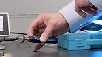 The item shown is a dental turbine handpiece, commonly used for high-speed drilling and polishing in dental procedures. 