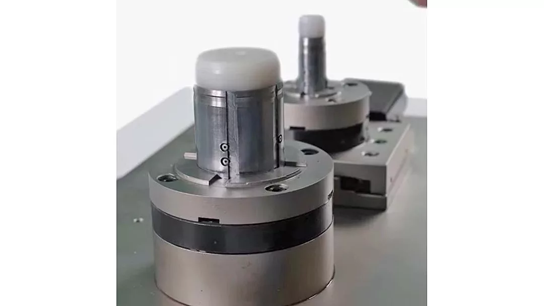 The item shown is a precision workholding clamping device, such as a chuck or collet system, used to secure workpieces in machinery like CNC milling machines.