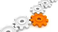 This image is a stock illustration depicting interconnected white gears with one prominent orange gear in the center. 