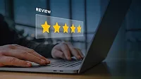 This image represents the concept of online customer feedback and reputation management, featuring a digital overlay of a five-star rating. 