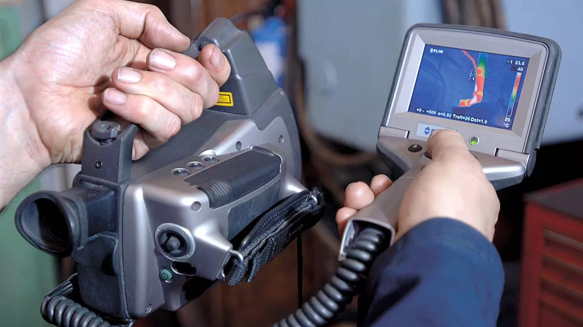The device in the image is a FLIR Systems ThermaCAM S60 infrared camera.