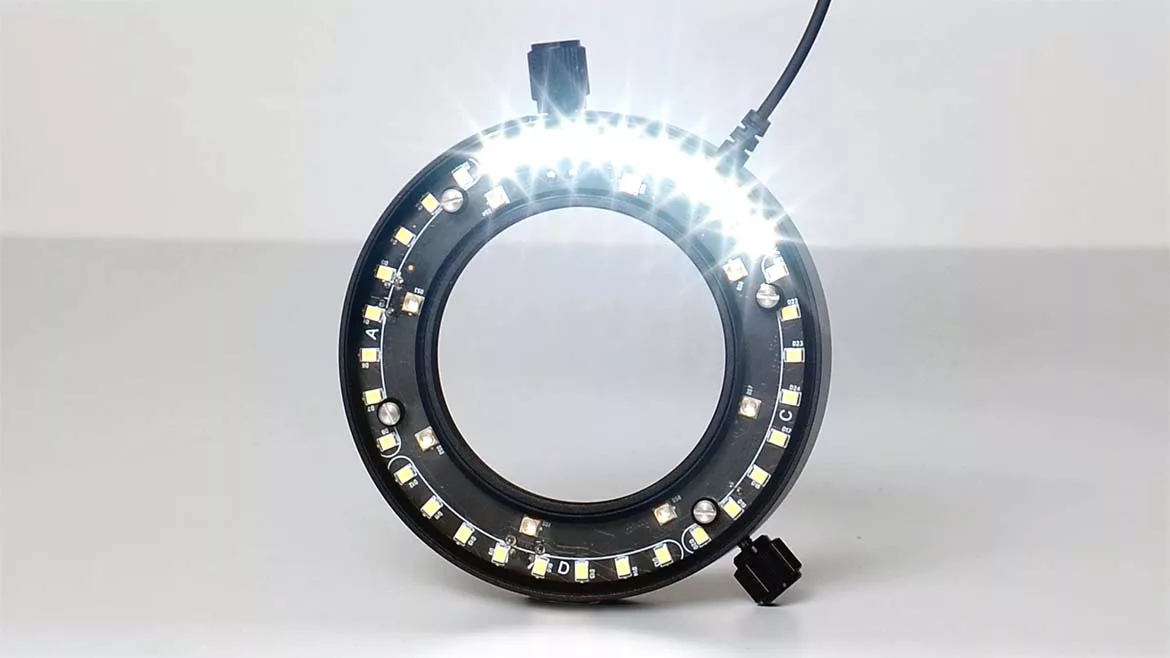 This item is a 56-LED Microscope Ring Light designed to provide focused, shadow-free illumination for stereo microscopes and industrial inspection.