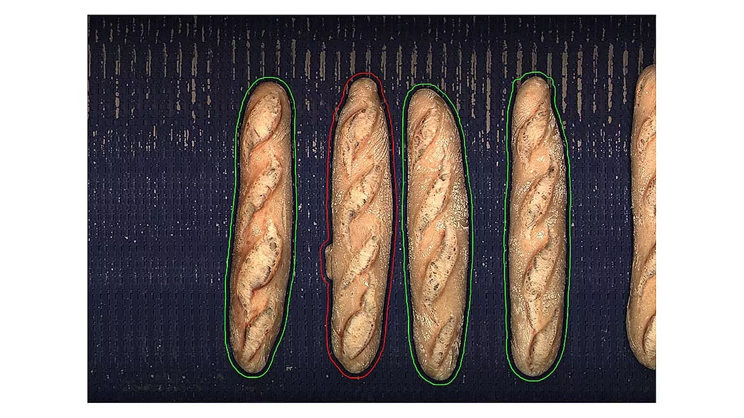 The image shows baguette bread, a long, thin loaf of French origin typically made from lean dough.