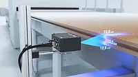 The item shown is a Baumer OX series smart 2D profile sensor 