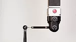 a Renishaw PH20 5-axis touch-trigger probe head used on a Coordinate Measuring Machine (CMM). 