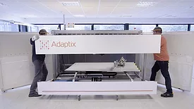 The image shows the Adaptix NDT3D inspection tool, a mobile 3D X-ray imaging system used for non-destructive testing (NDT). 