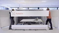 The image shows the Adaptix NDT3D inspection tool, a mobile 3D X-ray imaging system used for non-destructive testing (NDT). 