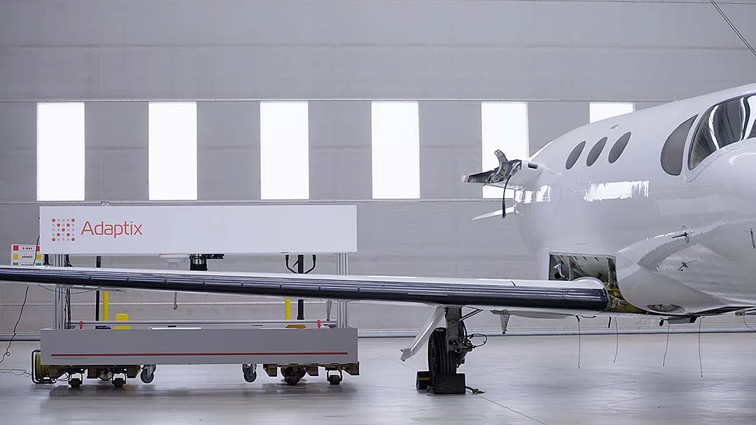 The image displays an Adaptix NDT3D inspection tool being used on an aircraft wing.