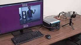 This image displays a high-speed machine vision system used for real-time human pose estimation. 