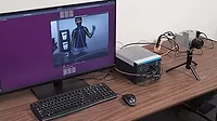 This image displays a high-speed machine vision system used for real-time human pose estimation. 