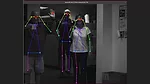 This image displays a real-time human pose estimation system in action.