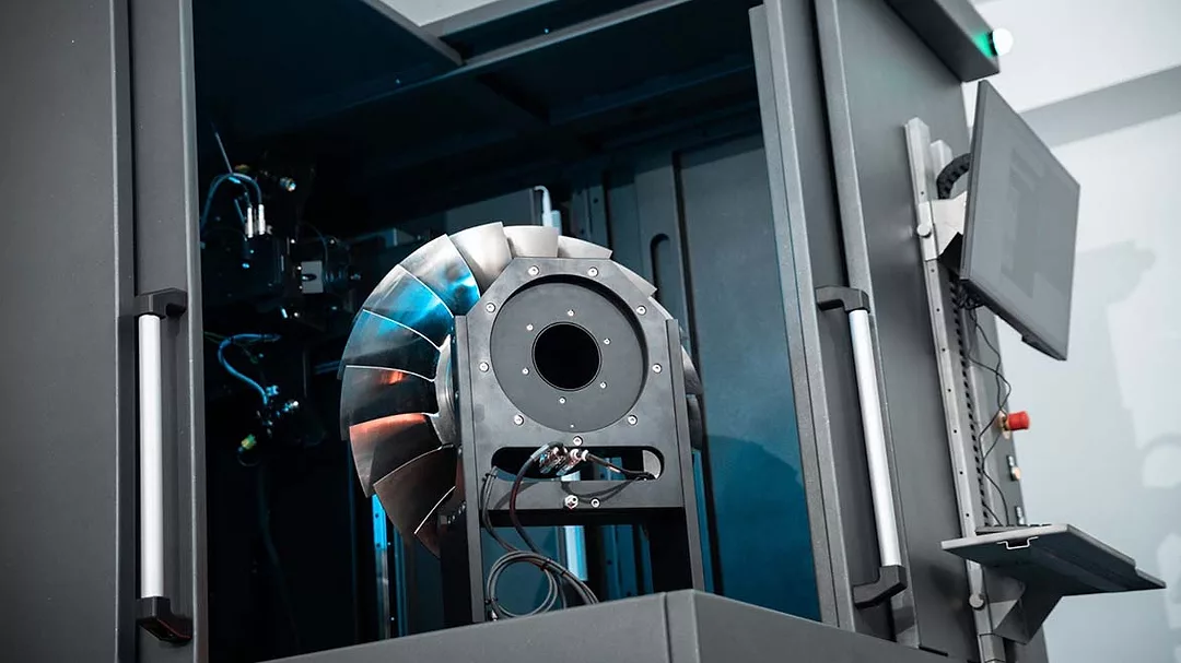 an industrial 3D printer or scanner designed for additive manufacturing processes