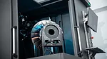 an industrial 3D printer or scanner designed for additive manufacturing processes